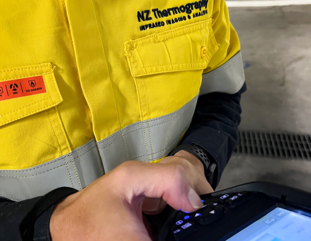 NZ Thermography technician recording readings on site